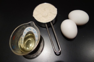 Basic matzo ball ingredients: 2 eggs, 2 tbsp oil, 1/2 cup matzo meal